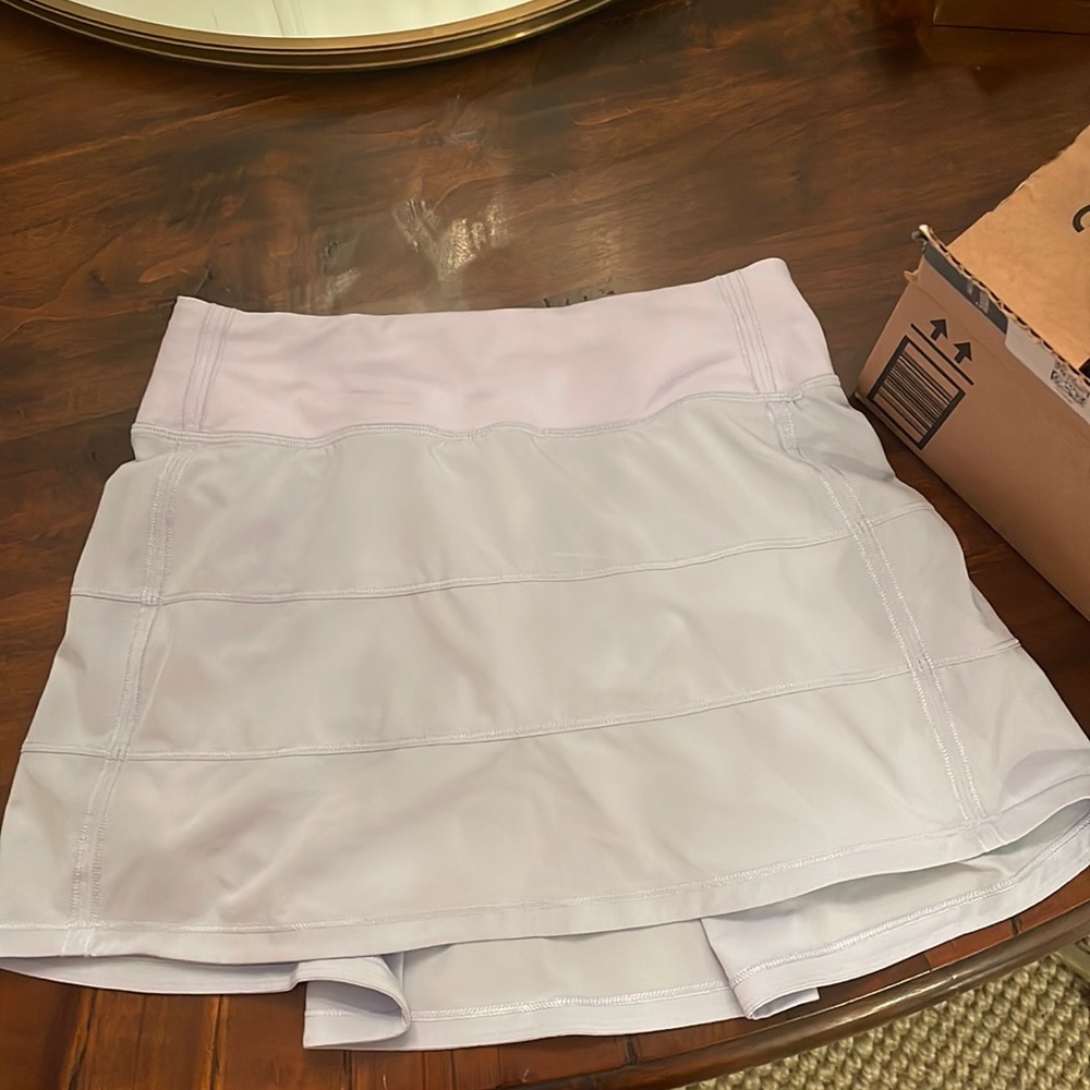 Pace Rival Mid-Rise Skirt. Size 2. A periwinkle/ lilac color